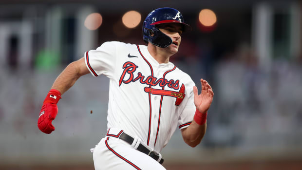 Apr 25, 2023; Atlanta, Georgia, USA; Atlanta Braves center fielder Sam Hilliard (14) runs to third against the Miami Marlins in fourth inning at Truist Park. Mandatory Credit: Brett Davis-USA TODAY Sports